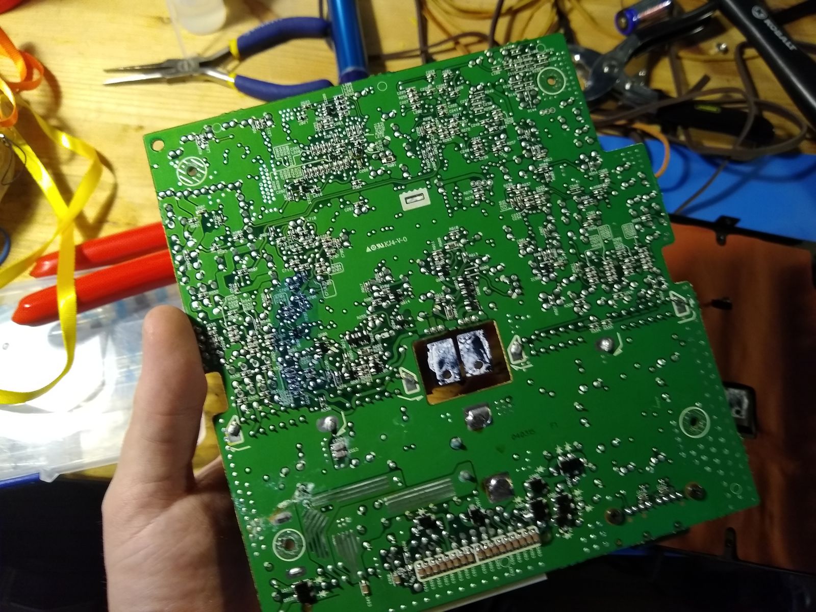 The blue is some form of conformal coating and looks semi-intentional. I did not remove it.