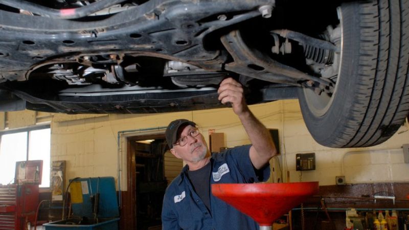 CDC head Mike Dorff works on his vehicle both for maintenance and as a hobby