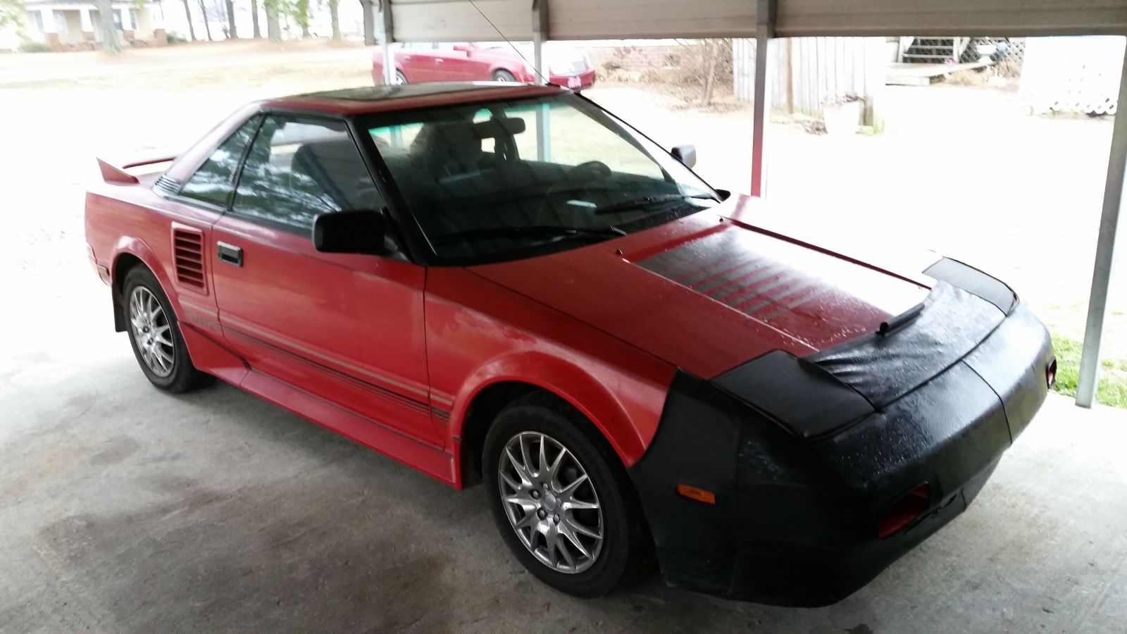 This is not my car, but before I bought my Miata I went and looked at this MR2. 