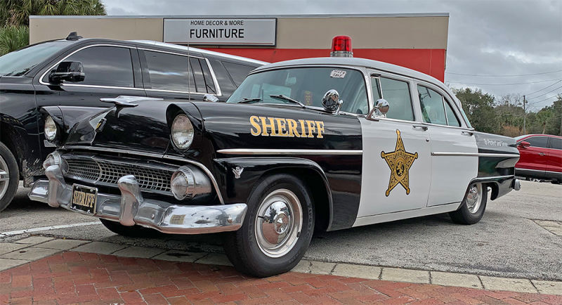 Sheriff’s patrol car parked downtown.