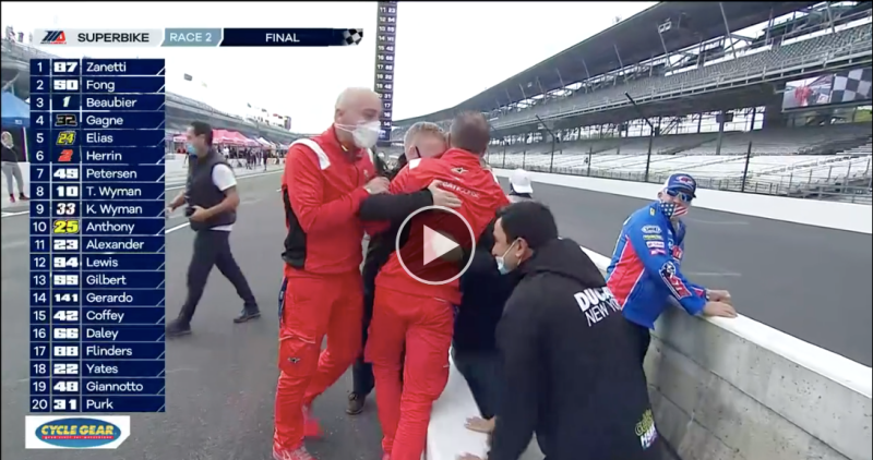 That guy in blue is pretty nonplussed at Zanetti’s Ducati crew celebrations.