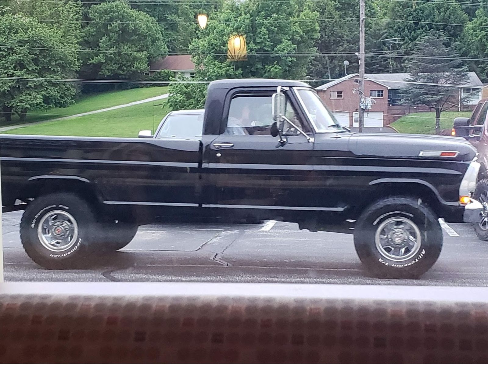 Ferd, seen through a dirty Olive Garden window.