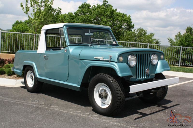1969 Jeepster Commando pickup, restored to its original Empire Blue paint.