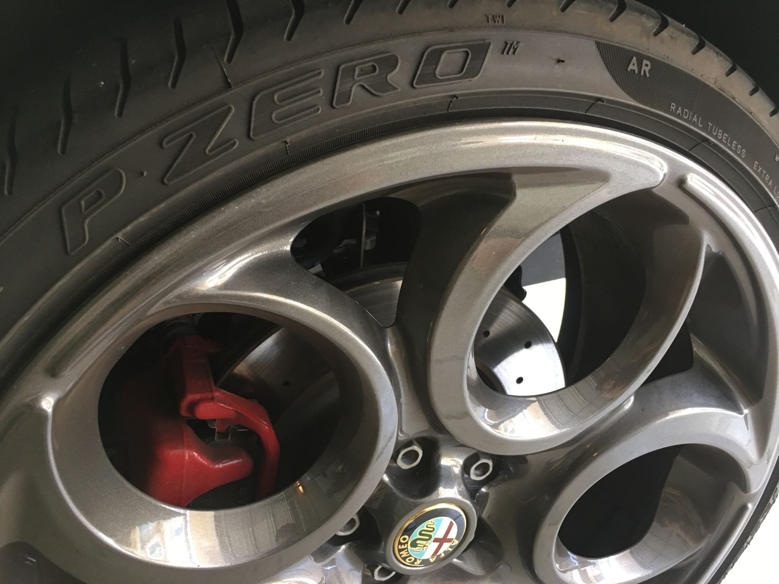 The wheels are another styling highlight, but the strange thing is Alfa chose a tire size that nobody makes. So for now I’m stuck with buying the special “AR” version of these Pirelli P-Zero tires. They’re okay, I guess.