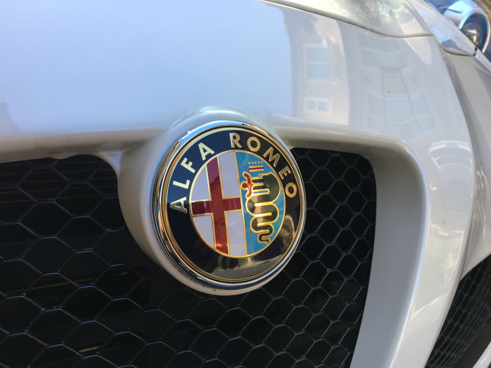 One styling detail that European cars consistently do well is the logo placement. European cars always have a raised nub or recessed body panel to “greet” the brand logo. It’s expensive, but does a lot to make a car look upscale. Alfa takes it to another level—there’s a special extension from the body just to frame it.