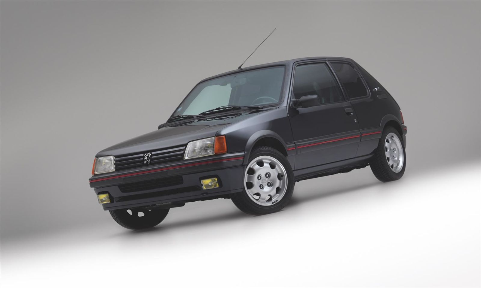 Illustration for article titled Heres an interesting car. Armoured Peugeot 205.