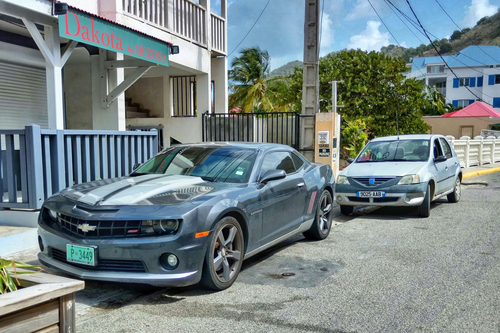 Illustration for article titled Saint Martin might be the only place in the world you can see a Camaro and a Dacia Logan together