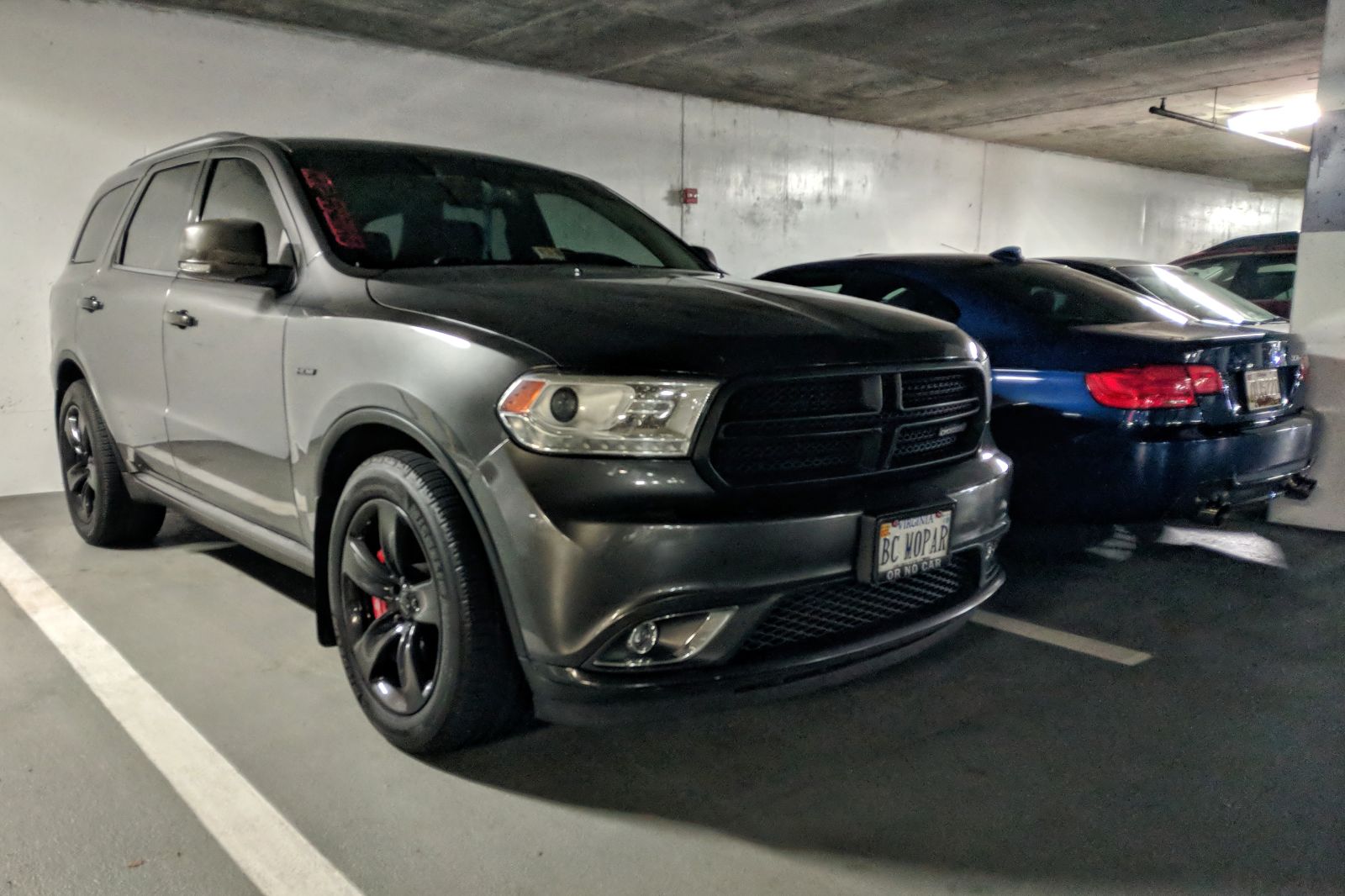 Illustration for article titled There are not one, but two, SRT vehicles with Mopar-themed vanity plates in my office parking garage