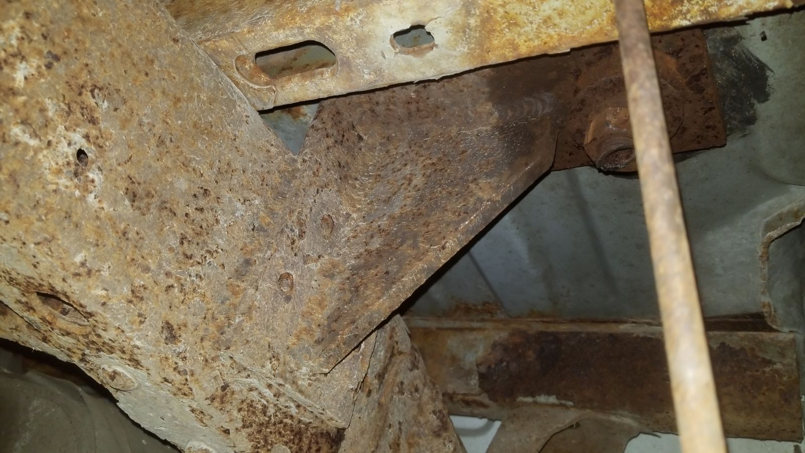These brackets are welded to the frame. They came off the previous work truck and for some reason work decided not to bolt them on. ARRRRGGGHHHH!!!