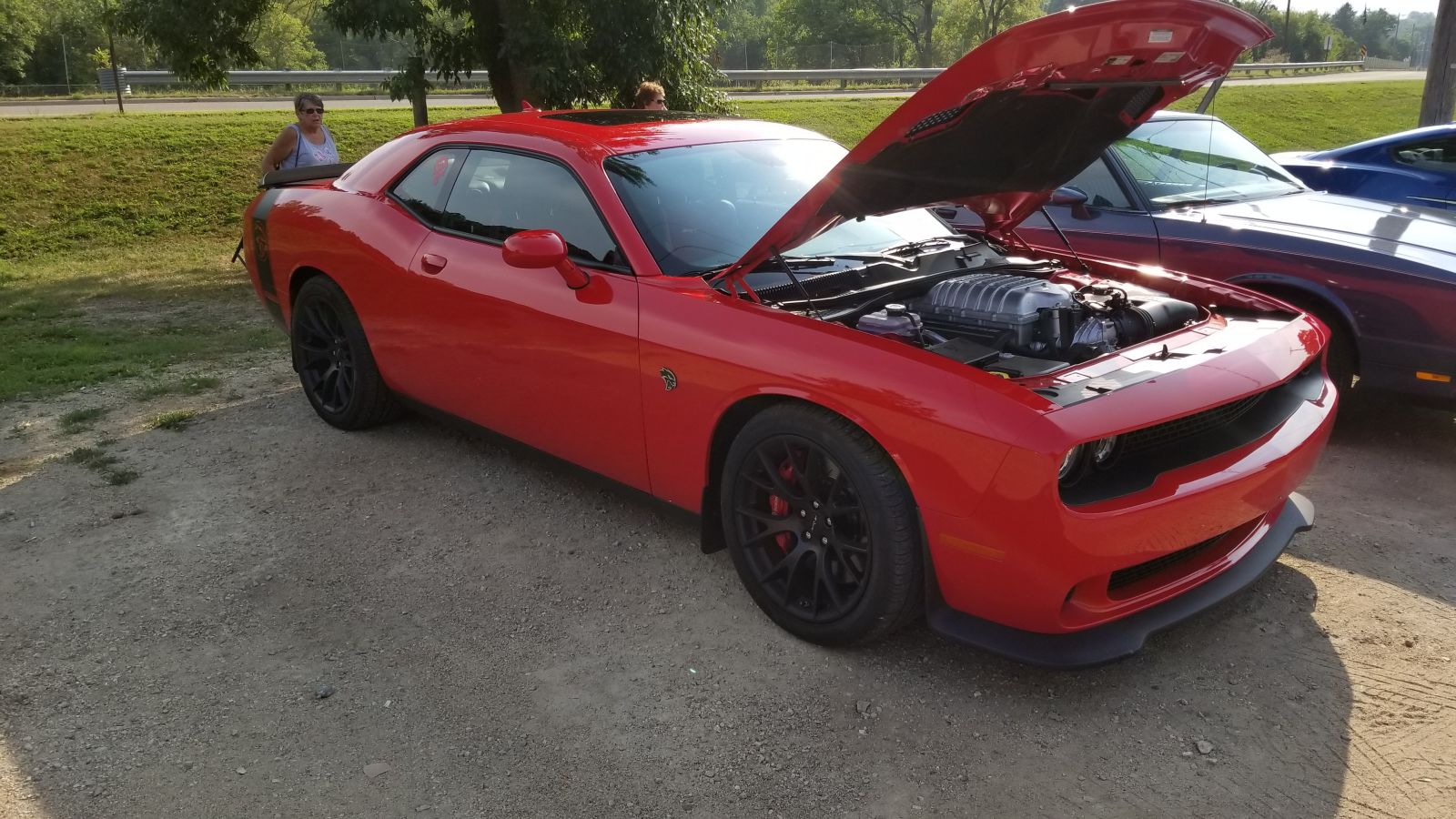 I have never seen a Hellcat in person. I need the engine out of it for reasons. I would also drive the shit out of this car as is. If I owned this, it would be the Green Go color.