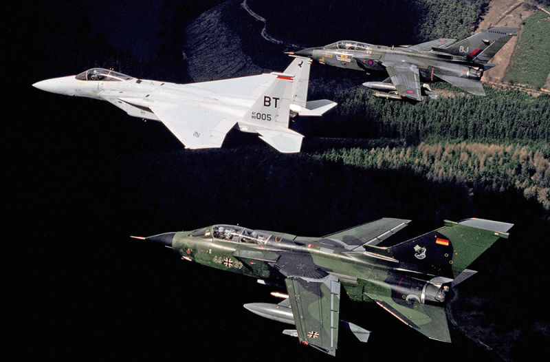 A US Air Force F-15C Eagle from Bitburg Air Base leads a pair of German Luftwaffe Tornados during a fly past over Germany (US Air Force)
