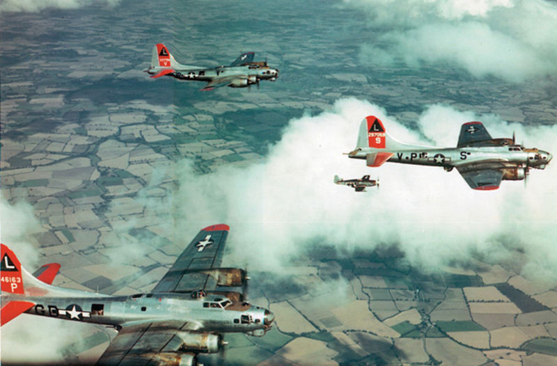 A P-51 Mustang escorts 8th Air Force B-17 Flying Fortress bombers on a raid into Germany. Once the long-range Mustang arrived on the scene, the USAAF finally had a fighter that could accompany the bombers all the way to the target and home again. (US Air Force)