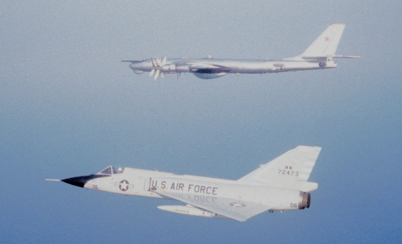 An F-106A Delta Dart of the 102nd Fighter Interceptor Wing of the Massachusetts Air National Guard intercepts a Soviet electronic intelligenceTu-95RT (Bear-D) off the coast of Yarmouth, Nova Scotia in 1982 (US Air Force)