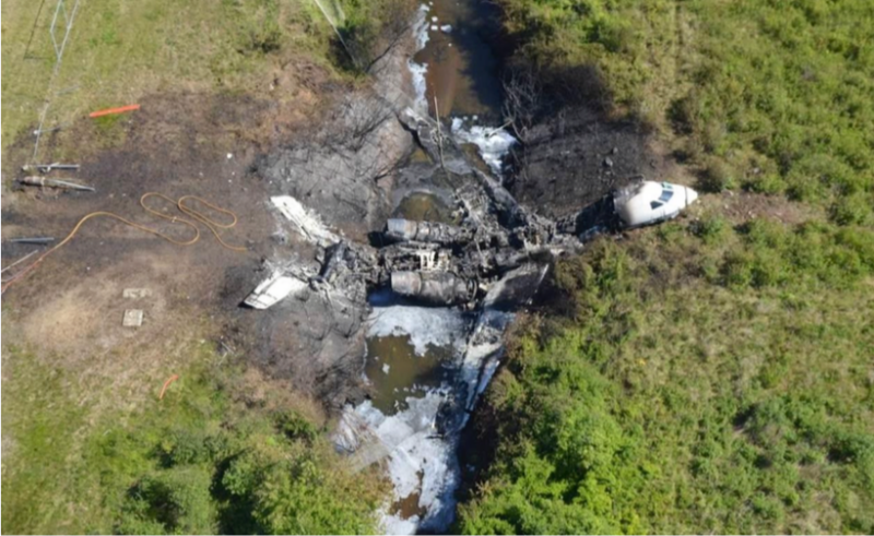The charred remains of Gulfstream IV N121JM. The crash killed all six passengers and crew. (Massachusetts State Police/NTSB)