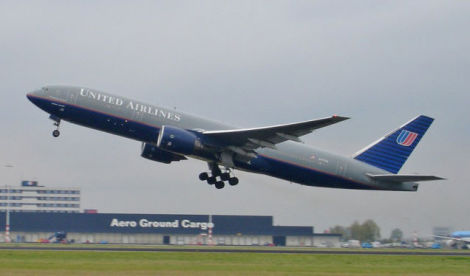 The first United Airlines 777-200 (N777UA) departs from Amsterdam’s Schiphol airport on October 16, 2004. (Solitude)