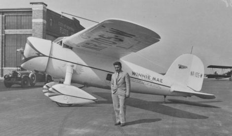 Wiley Post with his Lockheed Vega 5C “Winnie Mae” at Floyd Bennet Field in New York. (Smithsonian Institution)