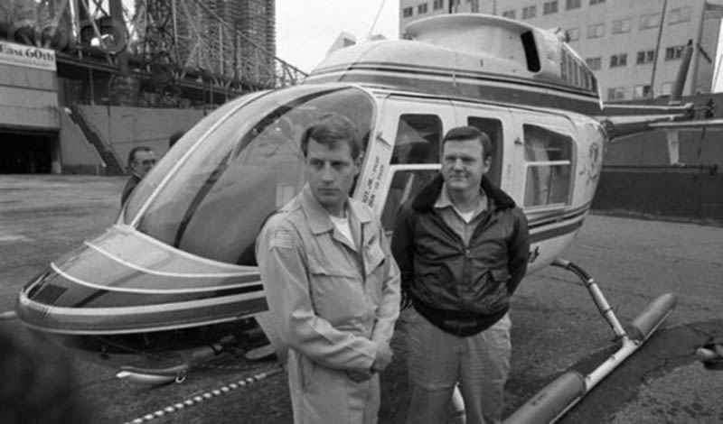 Perot, right, with pilot J.W. Coburn. (Bettman/Corbis)