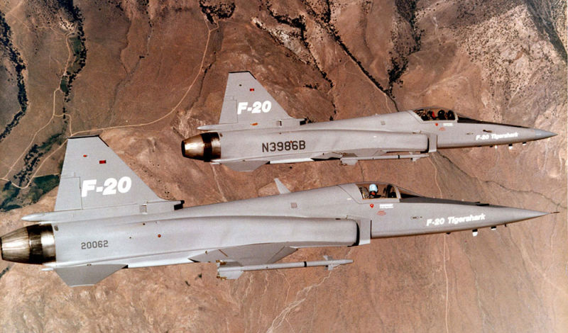 The first F-20, now in more military livery, flies alongside a second Tigershark with civilian registration (US Air Force)