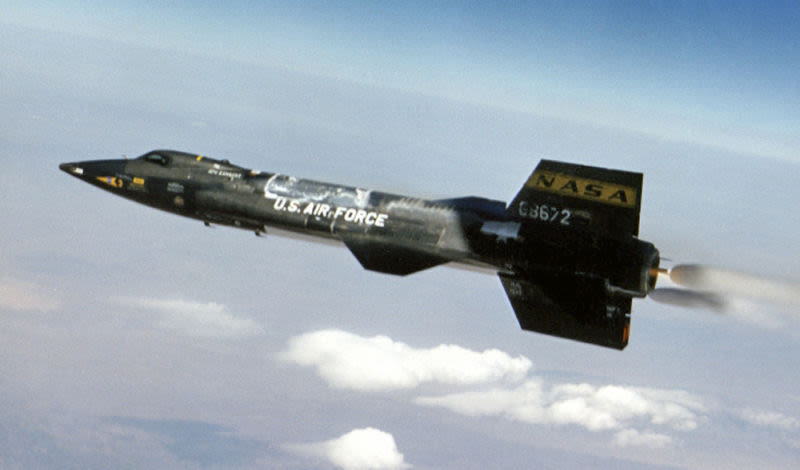The X-15 lights its rocket engine as it pulls away from the B-52 mothership (US Air Force)