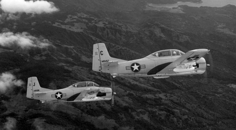A pair of South Vietnamese Air Force T-28C Trojans over the Vietnamese coastline in 1962. (US Air Force)