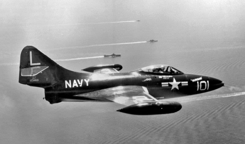 A US Navy Grumman F9F-2 Panther of fighter squadron VF-71 flies over Task Force 77 in 1952 during the Korean War (US Navy)