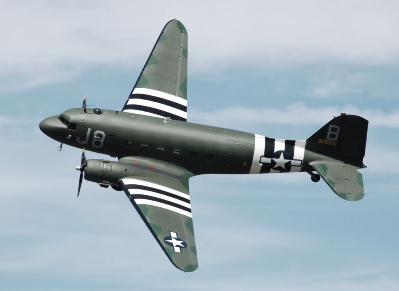 An former US Air Force C-47A Skytrain flies at the Cotswold Air Show in England in 2010. (Adrian Pingstone)