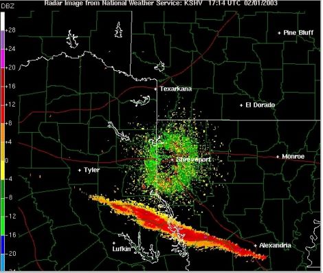 Debris from the disintegrating orbiter appears as a red and orange streak in this weather radar image (NASA)