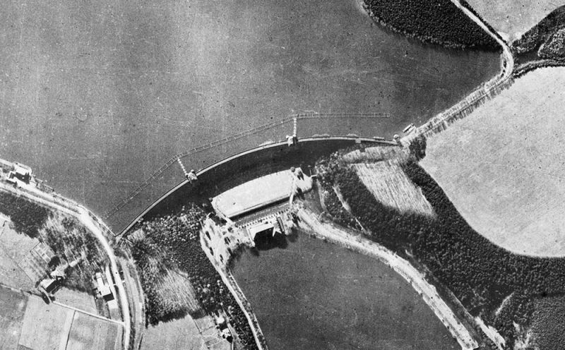 An RAF reconnaissance photo of the Möhne Dam before the attack. Note the torpedo nets above the dam. (Royal Air Force)