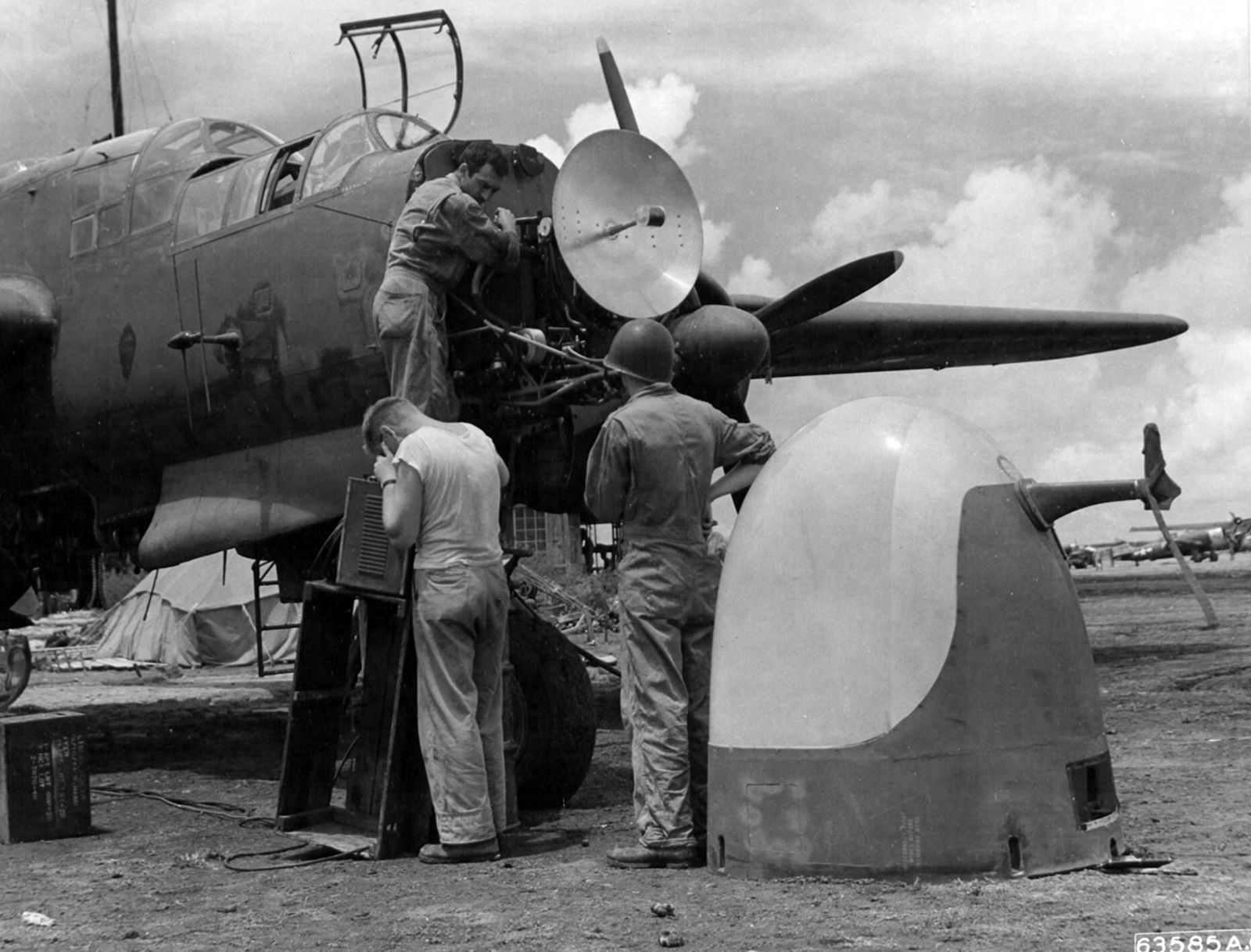The SCR-720 radar unit mounted to a P-61 Black Widow of the 6th Night Fighter Squadron undergoes maintenance on Saipan some time in 1945 (US Air Force)