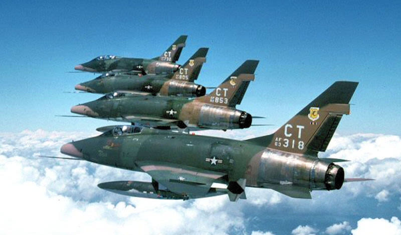 A formation of F-100D Super Sabres of the 118th Tactical Fighter Wing in Vietnam-era jungle camouflage in 1961 (US Air Force)