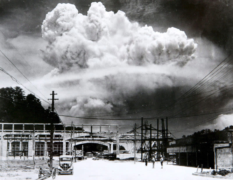 The mushroom cloud from the Fat Man atomic bomb billows over the city of Nagasaki on August 9, 1945 
