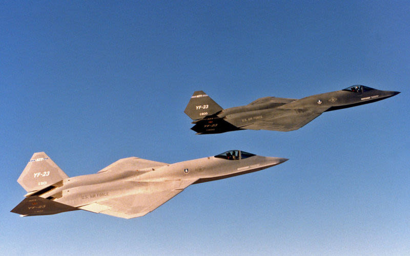 The two YF-23s, nicknamed Gray Ghost and Black Widow, fly in formation