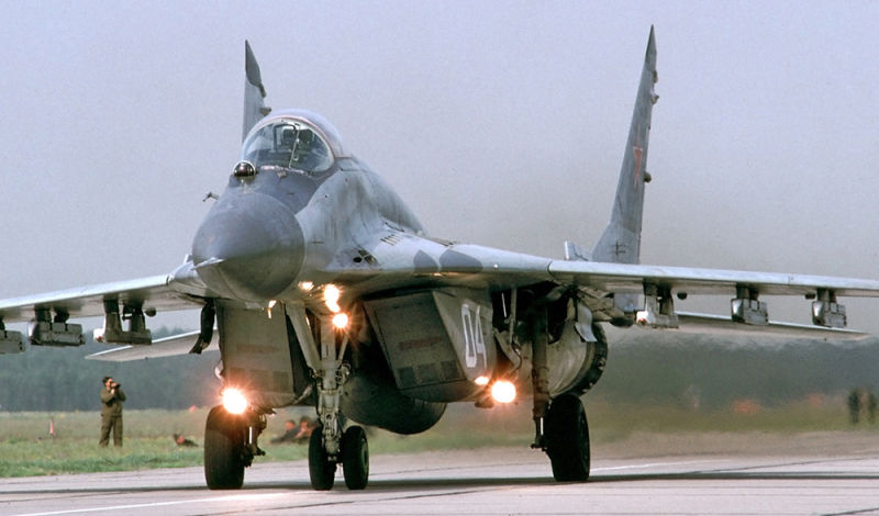 A MiG-29 taxis in the former East Germany in 1993. The intake flaps that protect the engine from foreign object debris can be seen in their closed position.